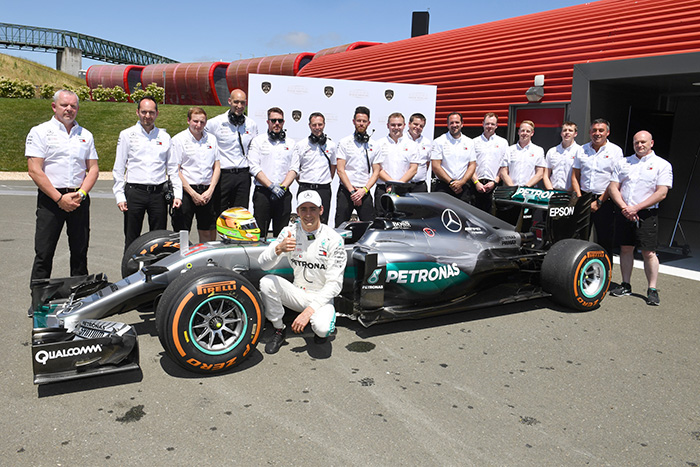 The Mercedes AMG Petronas F1 Team with Esteban Gutierrez and the W07/04.